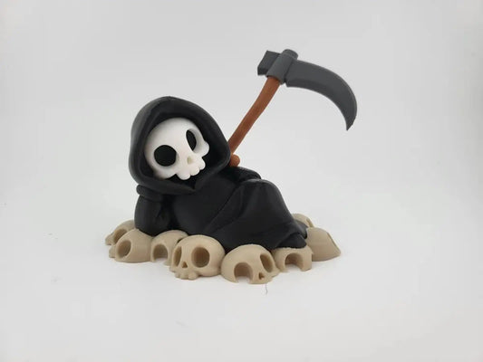 Chillin' Grim Reaper Skeleton Figure on Skull Pile My Store